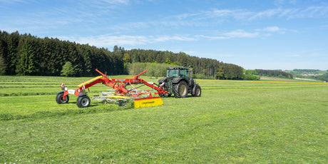 Pöttinger PÖTTINGER TOP Zweikreiselschwader mit Seitenablage mit Transportfahrwerk